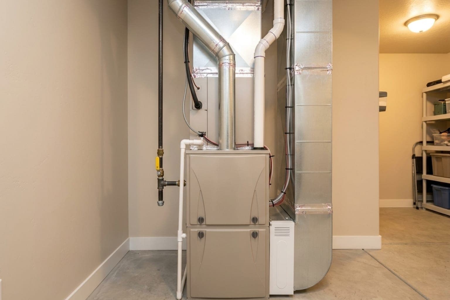 New high-efficiency furnace installed in a Salt Lake City home utility room with fresh ductwork
